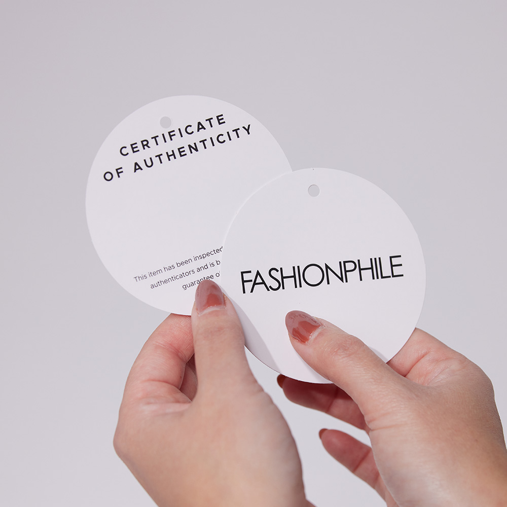 image of FASHIONPHILE's certificate of authenticity tags