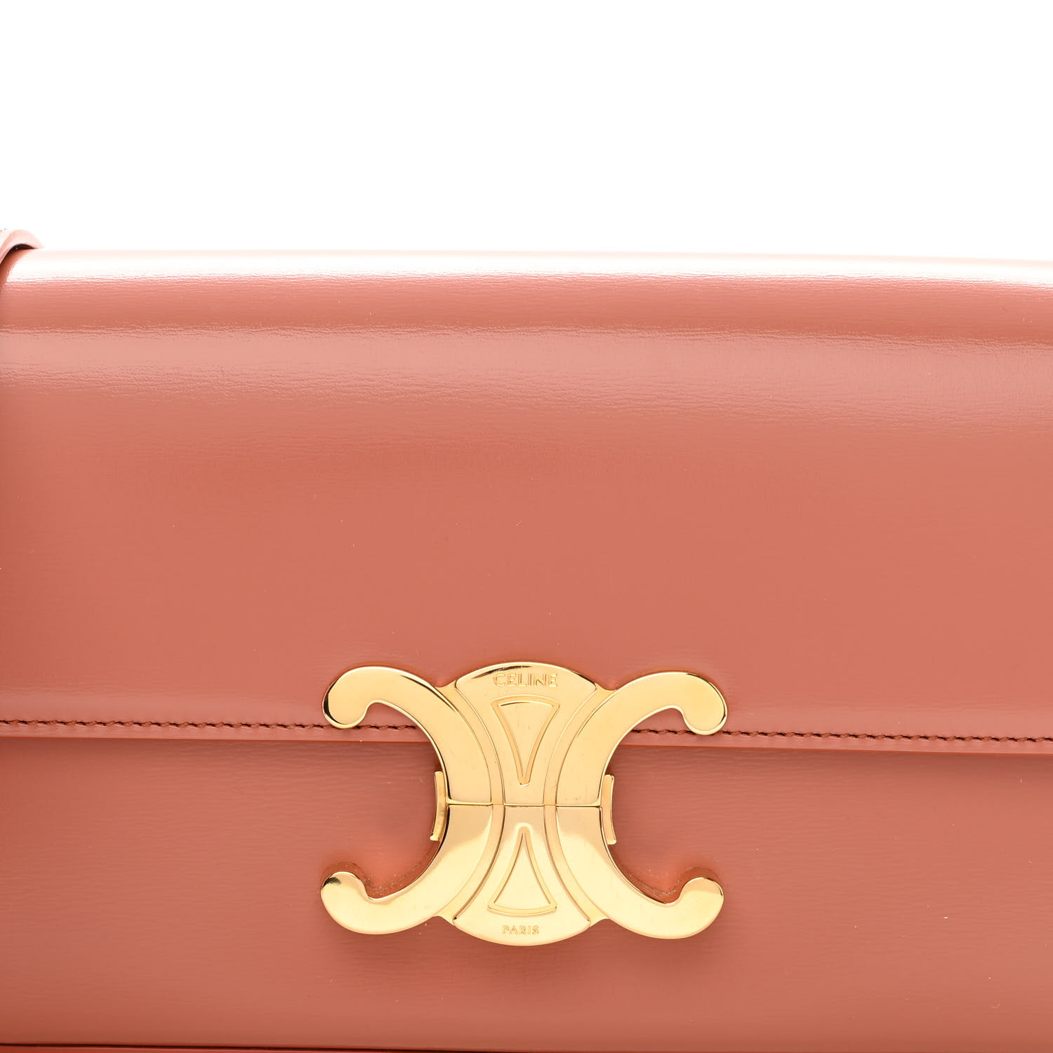 This is a product image from FASHIONPHILE of a close up of the Shiny Calfskin Triomphe Shoulder Bag in the color Terracotta