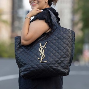 lifestyle image of model wearing saint laurent icare maxi shopping tote FASHIONPHILE