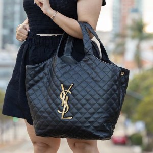 lifestyle image of model wearing saint laurent icare maxi shopping tote FASHIONPHILE