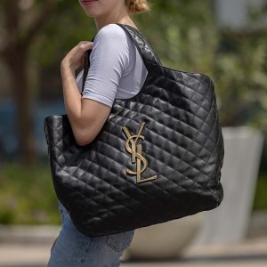 lifestyle image of model wearing saint laurent icare maxi shopping tote FASHIONPHILE