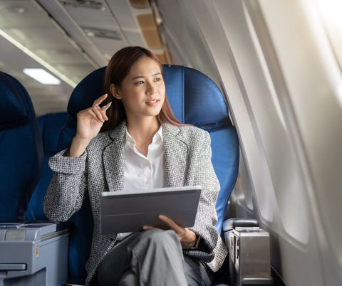 using a laptop on a plane